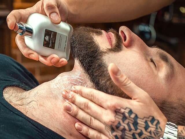 Royal shave in Oldboy Barbershop: Applying of aftershave care
